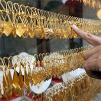 Vàng thế giới tăng trên 1.800 USD/ounce 