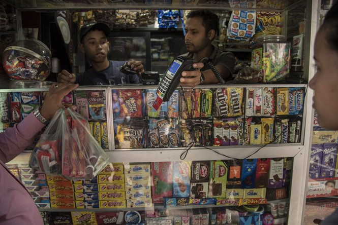 Siêu lạm phát Venezuela: Giăm bông, giày dép giá triệu bolivar