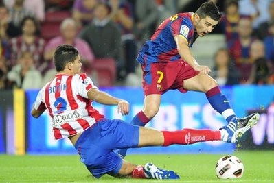 Barca vất vả đánh bại Sporting Gijon  